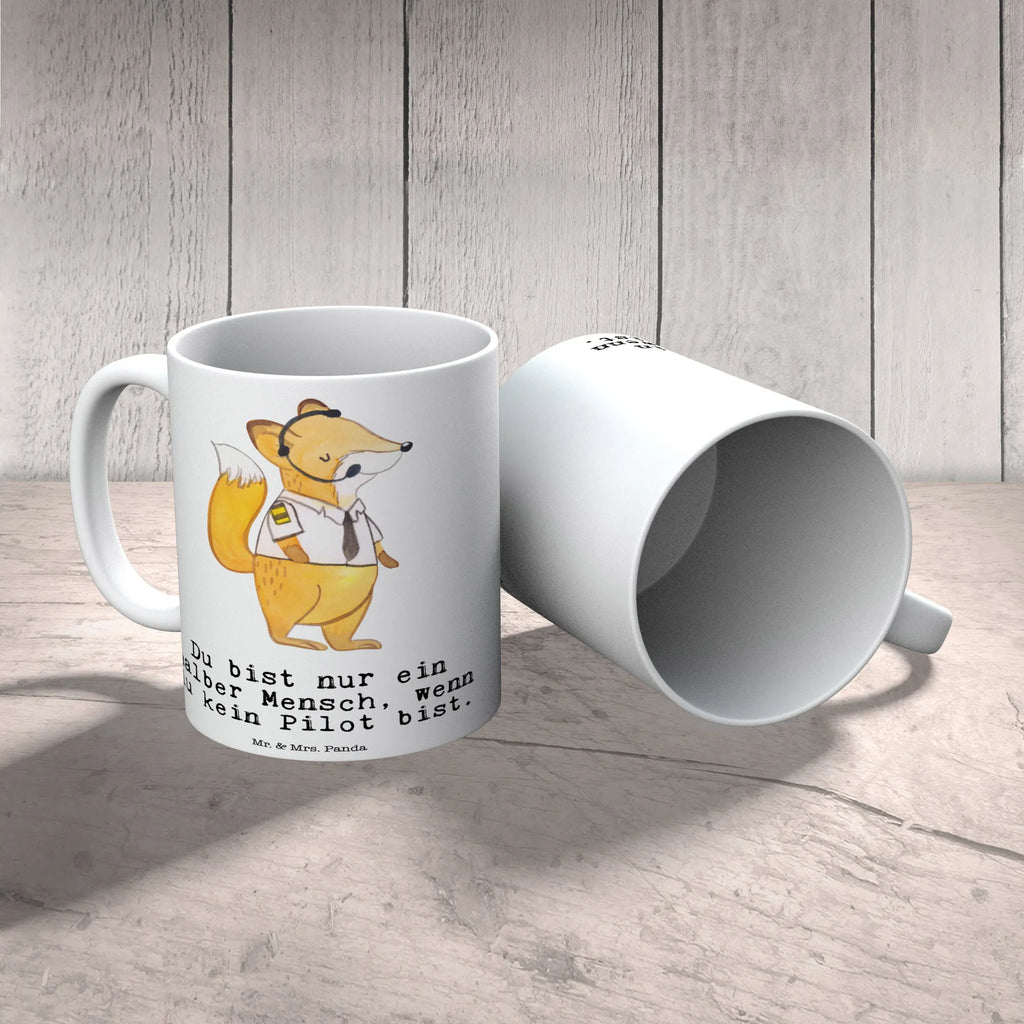 Tasse Pilot mit Herz Teepott, Pott, Becher, milchkaffeetasse, Motivtasse, Keramiktasse, tasse für kaffee, kaffeebecher keramik, Mug, Tasse mit Spruch, heißgetränkebecher, Henkelbecher, Kaffeetasse, haferl, Dekotasse, Coffee Mug, Designtasse, Keramikbecher, Kaffeepott, Henkeltasse, Trinktasse, Geschenktasse, Frühstückstasse, Trinkbecher, Tasse mit Motiv, Bürotasse, Teebecher, Frühstücksbecher, statement tasse, tasse für büro, Bedruckte Tasse, kaffeetasse bedruckt, Kaffeebecher, kaffeebecher bedruckt, schöne tasse, Tasse, hochwertige tasse, Kakaotasse, design tasse, kaffeetasse keramik, Bürobecher, Teetasse, Sprüchetasse, Abschied, Jubiläum, Rente, Kollege, Geschenk, Kollegin, Arbeitskollege, Mitarbeiter, Firma, Danke, Dankeschön, Schenken, Beruf, Ausbildung, Flugkapitän, Cockpit, Pilot, Flugzeug