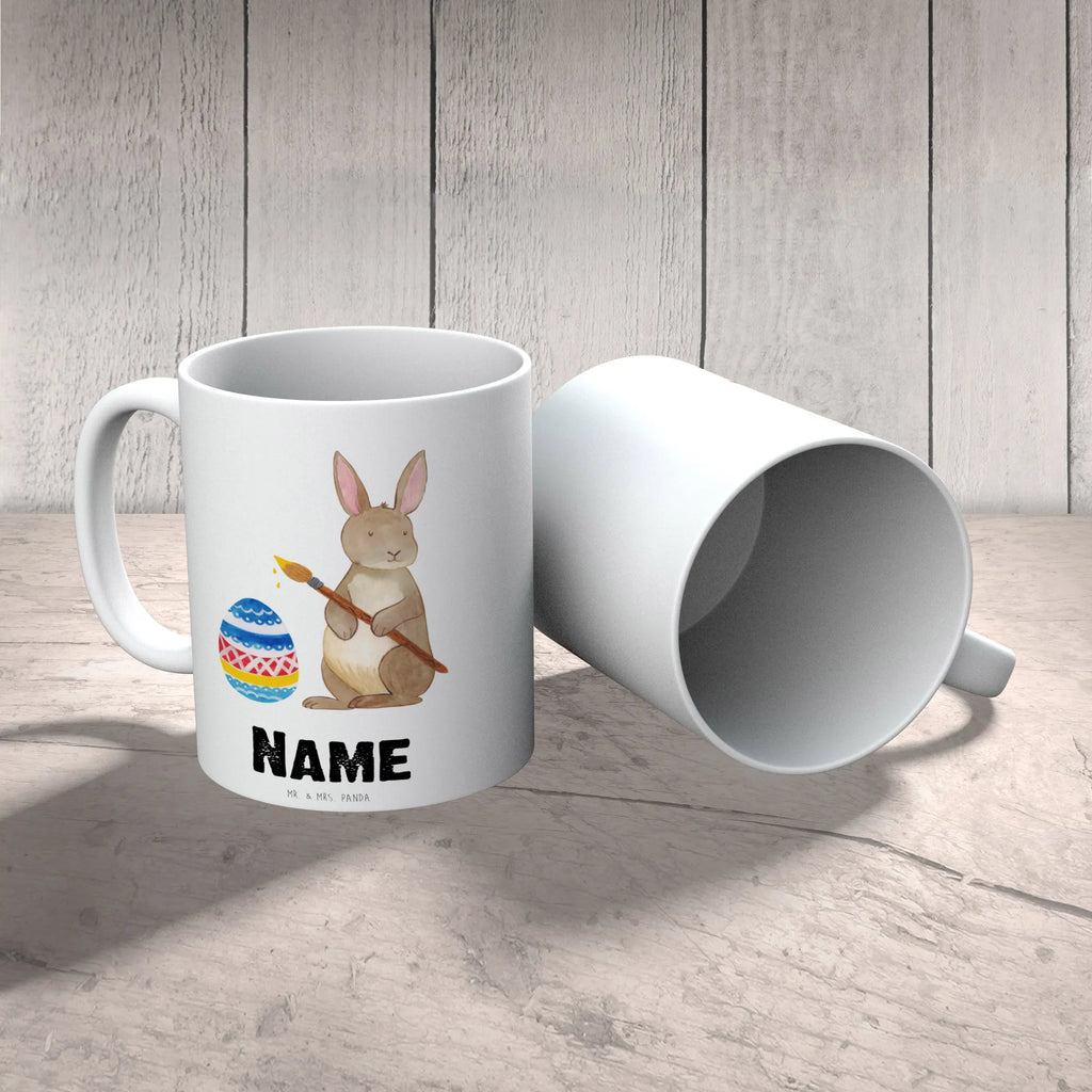 Personalisierte Tasse Hase Eiermalen Namenstasse, Namen, Personalisierte Tasse, Drucken, Personalisiert, Wunschname, Tasse, Tasse mit Namen, Ostern, Osterhase, Ostergeschenke, Osternest, Osterdeko, Geschenke zu Ostern, Ostern Geschenk, Ostergeschenke Kinder, Ostern Kinder, Hase, Ostergrüße, Kaninchen, Frohe Ostern, bemalte Ostereier, Osterei, Osterblume, Eiermalen