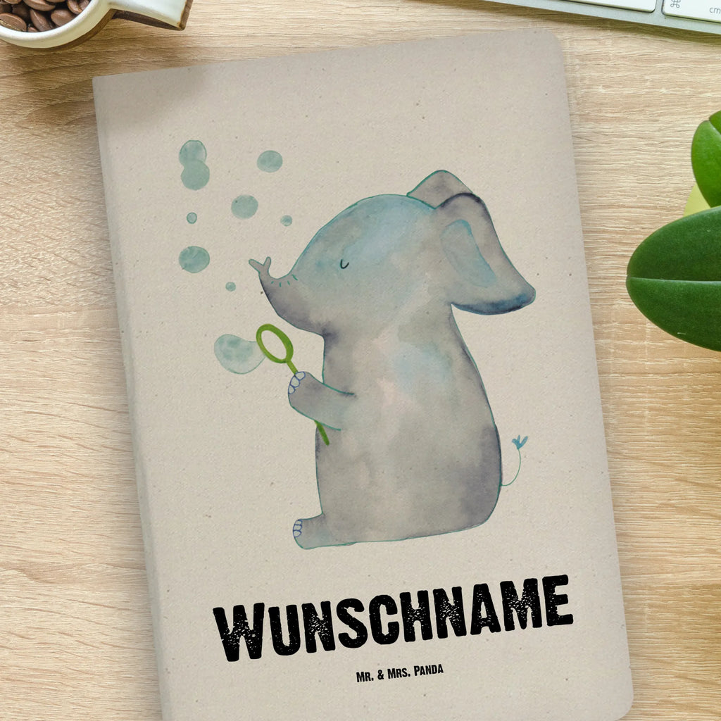 DIN A4 Personalisiertes Notizbuch Elefant Seifenblasen DIN A4 Arbeitsbuch Mit Wunschtext, A4 Notizbuch Punkte Mit Wunschtext, Notizbuch Mit Stoffeinband Und Wunschtext, Journal DIN A4 Personalisiert, DIN A4 Notizbuch Blanko Personalisiert, Notizbuch Aus Baumwolle Personalisiert, Öko Notizbuch DIN A4 Mit Wunschtext, DIN A4 Notizbuch Liniert Mit Wunschtext, DIN A4 Schüler Notizbuch Mit Namen, Handgemachtes Notizbuch DIN A4 Mit Wunschtext, DIN A4 Notizbuch Kariert Mit Namen, Umweltfreundliches A4 Notizbuch Mit Namen, DIN A4 Uni Notizbuch Personalisiert, DIN A4 Lehrer Notizbuch Mit Wunschtext, Personalisierbares Notizbuch DIN A4, DIN A4 Notizbuch Softcover Mit Wunschtext, DIN A4 Notizbuch Hardcover Personalisiert, Stoff Notizbuch A4 Mit Namen, DIN A4 Notizbuch Als Geschenk Mit Namen, DIN A4 Notizbuch Für Schule Mit Namen, DIN A4 Skizzenbuch Mit Namen, DIN A4 Notizheft Mit Wunschtext, Schreibbuch DIN A4 Mit Text, DIN A4 Ideenbuch Personalisiert, DIN A4 Notizbuch Kreativ Mit Text, Nachhaltiges Notizbuch DIN A4 Mit Gravur, DIN A4 Projektbuch Mit Wunschtext, DIN A4 Bullet Journal Mit Namen, DIN A4 Notizbuch Mit Wunschtext, DIN A4 Tagebuch Mit Wunschtext, DIN A4 Notizbuch Büro Mit Gravur, Lustige Sprüche, Tiere, Tiermotive, Gute Laune, Liebesspruch, Dickhäuter, Heimat, Rüsseltier, Seifenblasen, Gefühl. Daheim, Elefant, Liebesbeweis, Liebe, Elefanten
