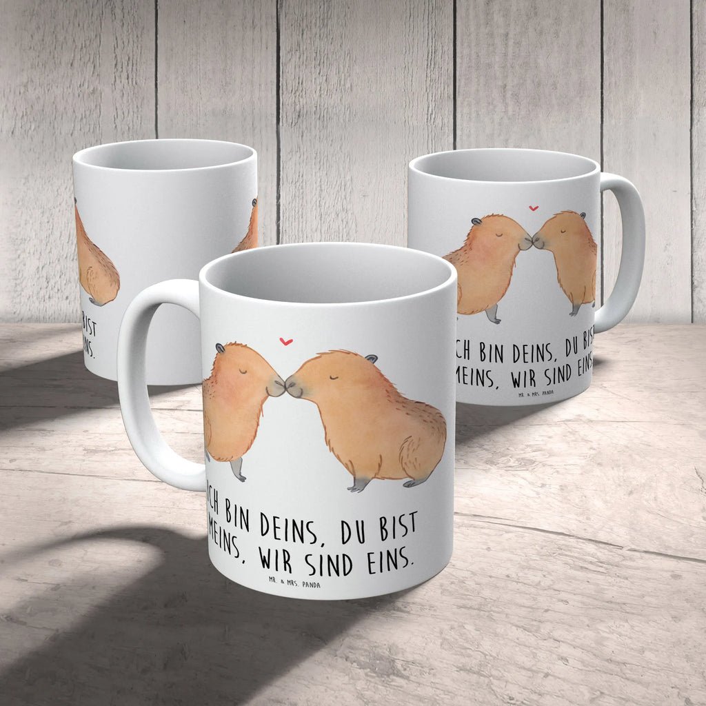 Mug Capybara love Tasse, Tasse mit Zitaten, Teetasse, Geschenktasse, Kaffeetasse, Keramiktasse, Bürotasse, Tasse mit Motiven, Porzellantasse, Tiermotive, Gute Laune, lustige Sprüche, Tiere, Tierliebe, Liebe, Paar, Liebesspruch, Valentinstag, Geschenkidee, Handgezeichnet, Liebesbeweis, Partnertiere, Capybara, Jahrestag, verliebt, Romantisches Geschenk, Herzlich, Du bist meins, Kuschel Capybaras, Ehejubiläum, Ich bin deins, Beziehung, Verschmolzen