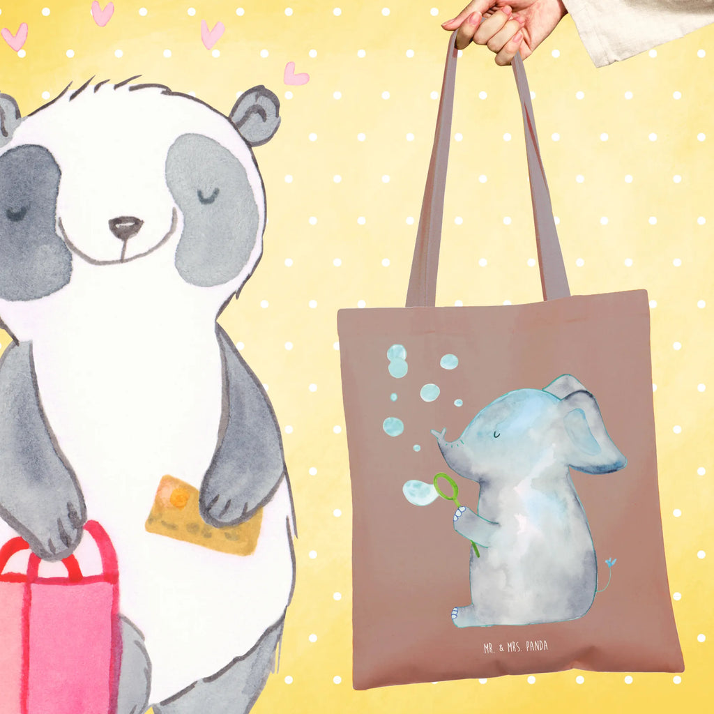 Tragetasche Elefant Seifenblasen Tragetasche, Umhängetasche, Tasche, Jutebeutel, Beuteltasche, Laptoptasche, Einkaufstüte, Einkaufstasche, Schultertasche, Shopper, Jutetasche, Stofftasche, Stoffbeutel, Beutel, Strandtasche, Badetasche, Tiermotive, Gute Laune, lustige Sprüche, Tiere, Elefanten, Liebesbeweis, Rüsseltier, Heimat, Liebesspruch, Liebe, Dickhäuter, Elefant, Seifenblasen, Gefühl. Daheim