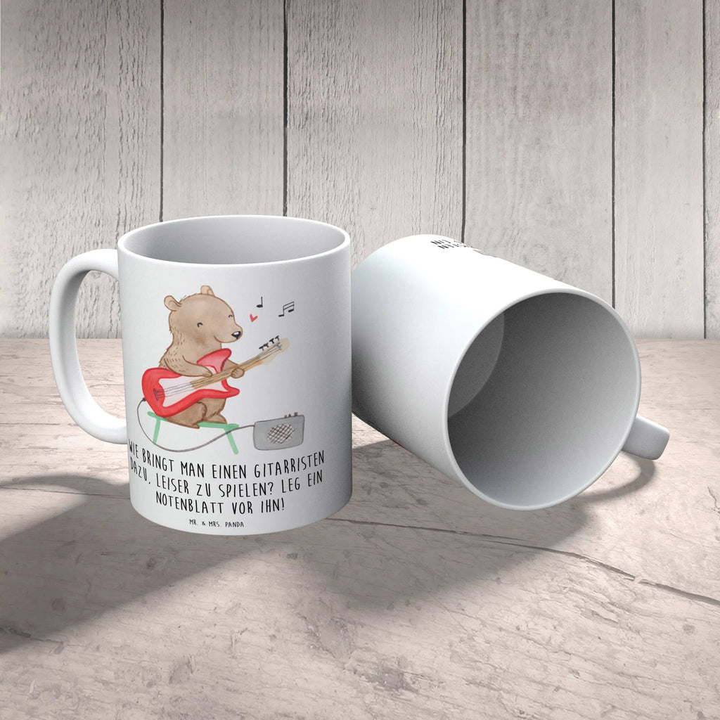 Mug Wie bringt man einen Gitarristen dazu, leiser zu spielen? Leg ein Notenblatt vor ihn! Keramiktasse, Bürotasse, Porzellantasse, Tasse mit Zitaten, Geschenktasse, Tasse, Teetasse, Tasse mit Motiven, Kaffeetasse, Instrumente, Geschenke Musiker, Musikliebhaber