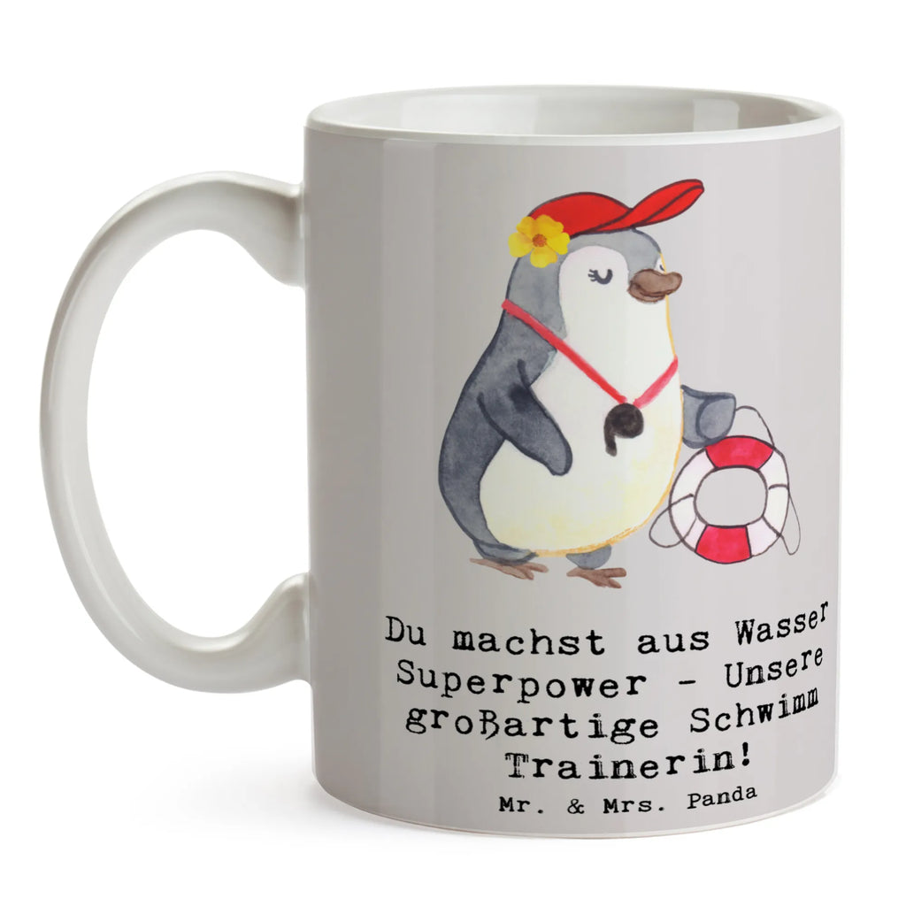 Mug Du machst aus Wasser Superpower - Unsere großartige Schwimm Trainerin! Tasse, Kaffeetasse, Teetasse, Becher, Kaffeebecher, Teebecher, Keramiktasse, Porzellantasse, Büro Tasse, Geschenk Tasse, Tasse Sprüche, Tasse Motive, Kaffeetassen, Tasse bedrucken, Designer Tasse, Cappuccino Tassen, Schöne Teetassen, Geschenk, Sport, Sportart, Hobby, Schenken, Danke, Dankeschön, Auszeichnung, Gewinn, Sportler