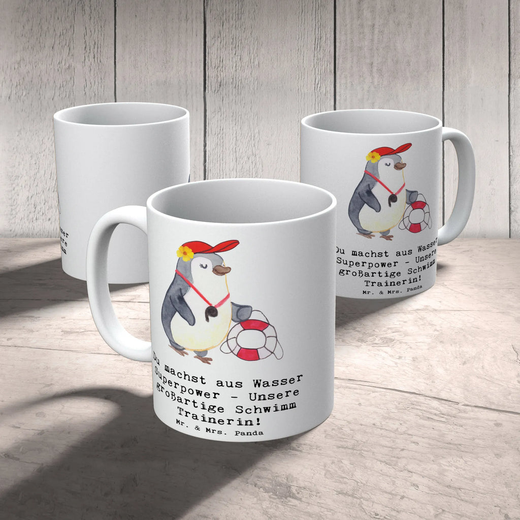 Mug Du machst aus Wasser Superpower - Unsere großartige Schwimm Trainerin! Tasse, Kaffeetasse, Teetasse, Becher, Kaffeebecher, Teebecher, Keramiktasse, Porzellantasse, Büro Tasse, Geschenk Tasse, Tasse Sprüche, Tasse Motive, Kaffeetassen, Tasse bedrucken, Designer Tasse, Cappuccino Tassen, Schöne Teetassen, Geschenk, Sport, Sportart, Hobby, Schenken, Danke, Dankeschön, Auszeichnung, Gewinn, Sportler