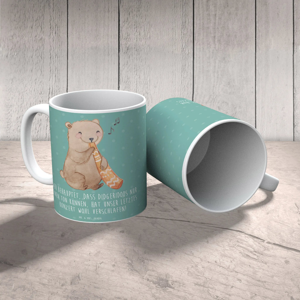 Mug Wer behauptet, dass Didgeridoos nur einen Ton können, hat unser letztes Konzert wohl verschlafen! Kaffeetasse, Teetasse, Keramiktasse, Tasse, Tasse mit Zitaten, Geschenktasse, Bürotasse, Porzellantasse, Tasse mit Motiven, Instrumente, Geschenke Musiker, Musikliebhaber