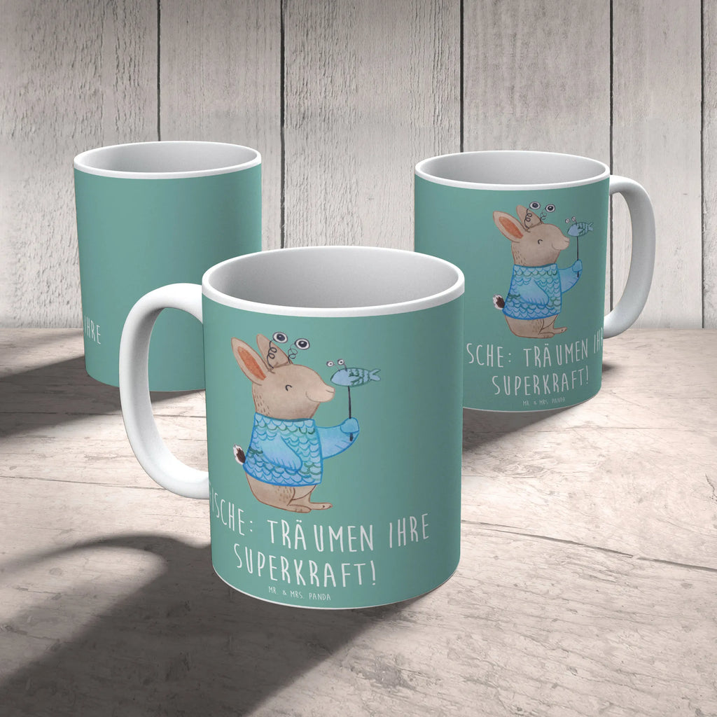 Mug Fische: Träumen ihre Superkraft! Tasse mit Motiven, Tasse, Geschenktasse, Tasse mit Zitaten, Keramiktasse, Teetasse, Porzellantasse, Kaffeetasse, Bürotasse, Tierkreiszeichen, Sternzeichen, Horoskop, Astrologie, Aszendent