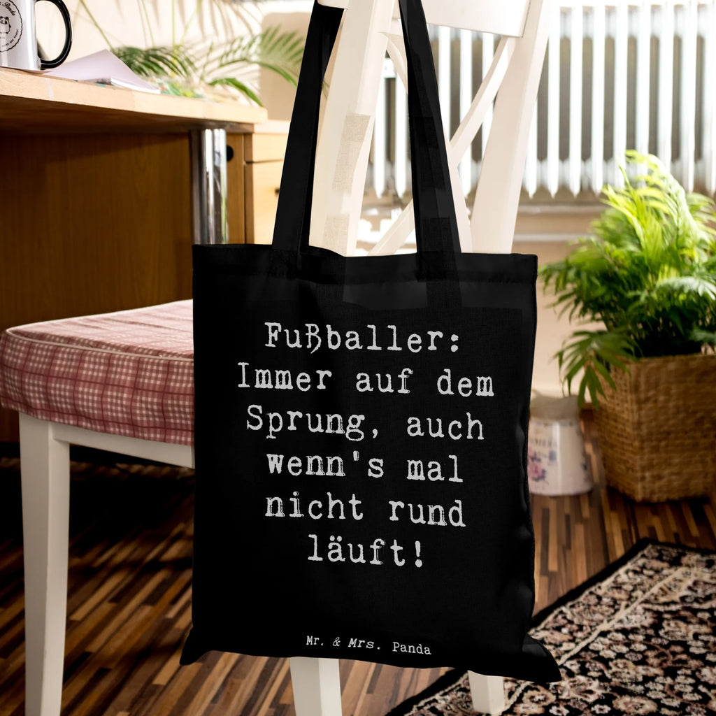 Tragetasche Spruch Fußballer: Immer auf dem Sprung, auch wenn's mal nicht rund läuft! Einkaufstasche, Beutel, Shopper, Einkaufstüte, Umhängetasche, Jutebeutel, Stofftasche, Beuteltasche, Jutetasche, Tasche, Badetasche, Tragetasche, Schultertasche, Stoffbeutel, Laptoptasche, Strandtasche, Beruf, Ausbildung, Jubiläum, Abschied, Rente, Kollege, Kollegin, Geschenk, Schenken, Arbeitskollege, Mitarbeiter, Firma, Danke, Dankeschön