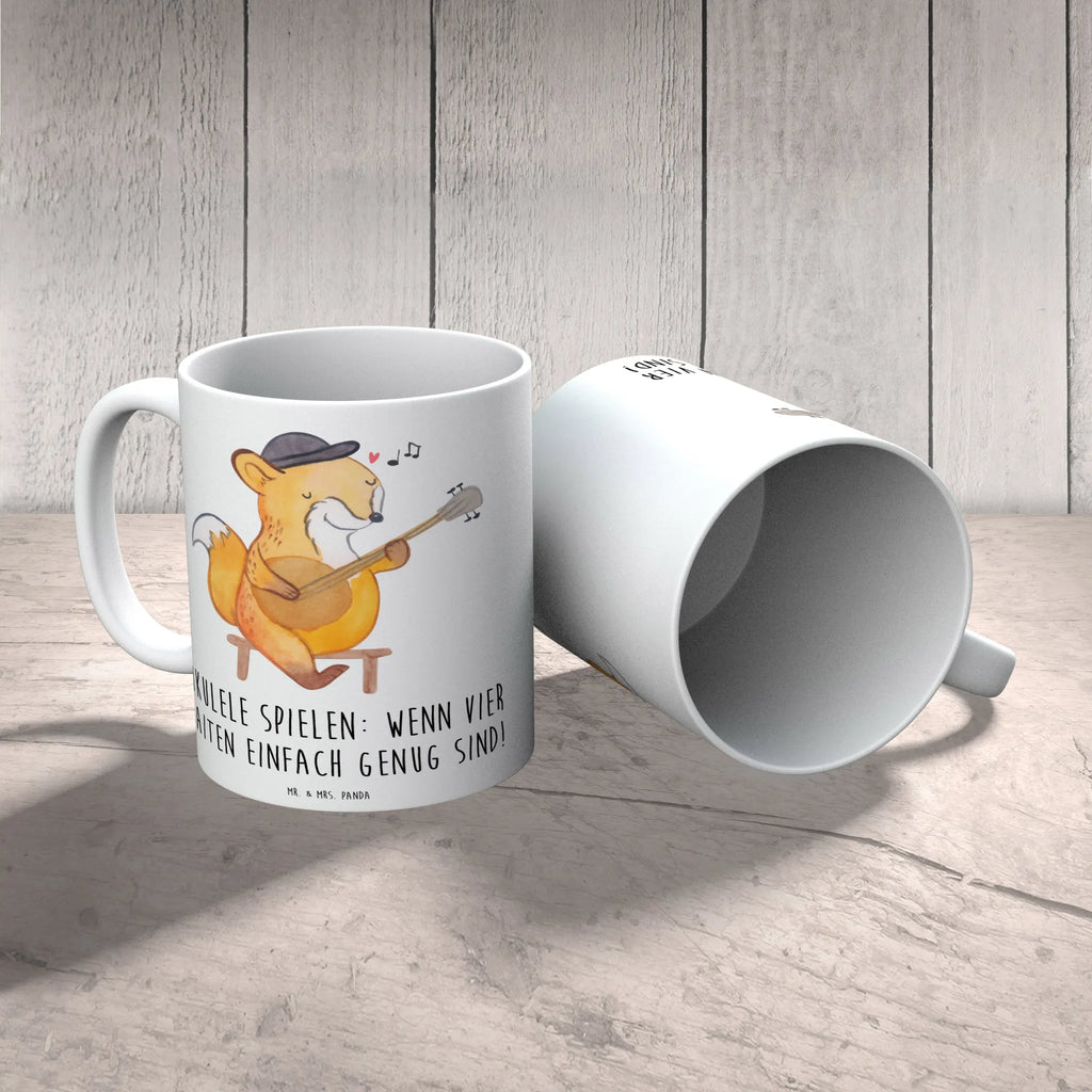 Mug Ukulele spielen: Wenn vier Saiten einfach genug sind! Tasse, Kaffeetasse, Tasse mit Zitaten, Geschenktasse, Keramiktasse, Bürotasse, Teetasse, Porzellantasse, Tasse mit Motiven, Instrumente, Geschenke Musiker, Musikliebhaber