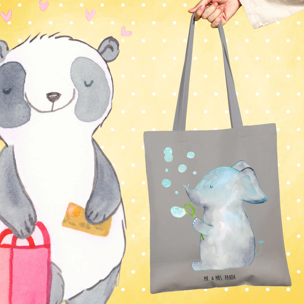 Tragetasche Elefant Seifenblasen Tragetasche, Umhängetasche, Tasche, Jutebeutel, Beuteltasche, Laptoptasche, Einkaufstüte, Einkaufstasche, Schultertasche, Shopper, Jutetasche, Stofftasche, Stoffbeutel, Beutel, Strandtasche, Badetasche, Tiermotive, Gute Laune, lustige Sprüche, Tiere, Elefanten, Liebesbeweis, Rüsseltier, Heimat, Liebesspruch, Liebe, Dickhäuter, Elefant, Seifenblasen, Gefühl. Daheim